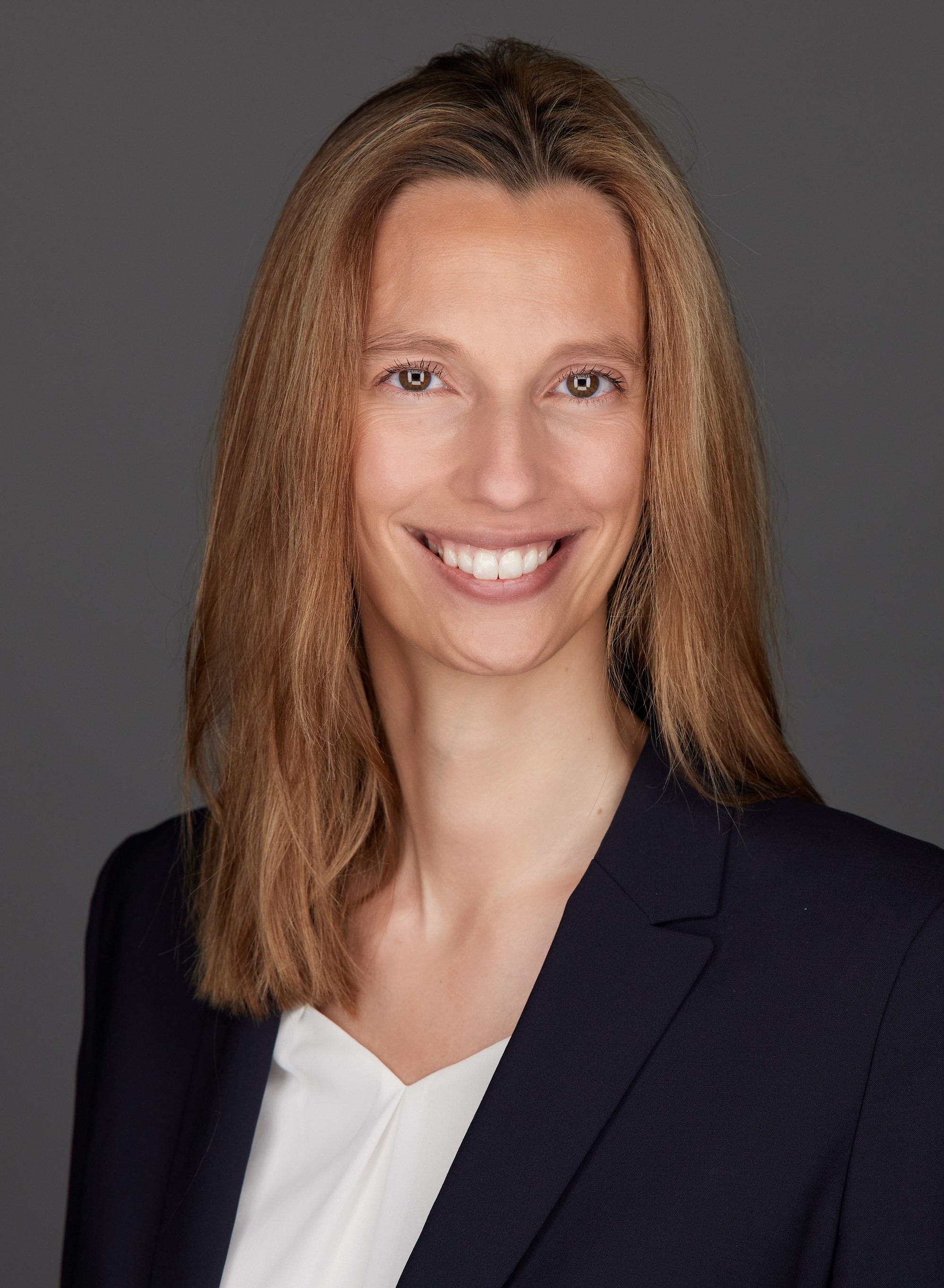 Professor_Julia_Binder seen in a formal office outfit